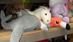 Shelf Full of Stuffed Animals