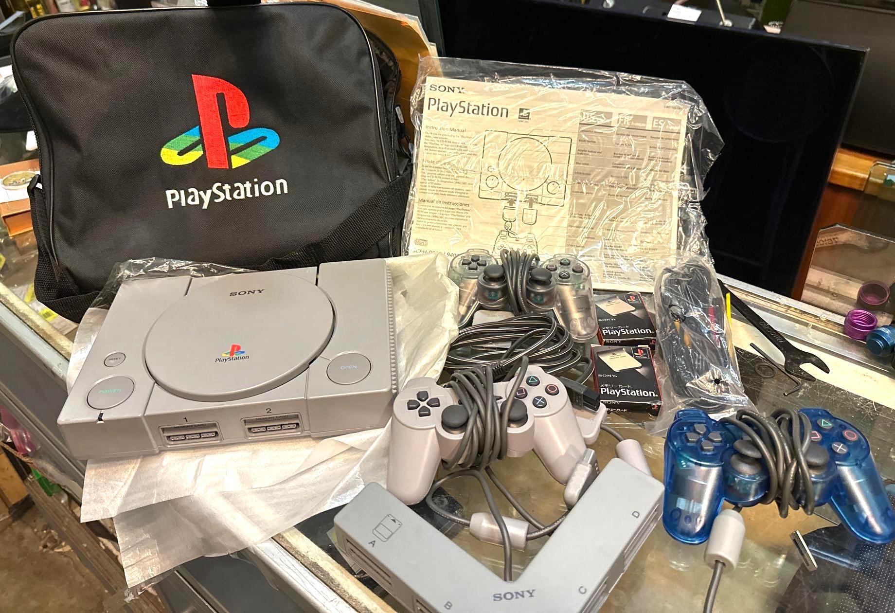 Sony PlayStation Console, 3 Controllers, Case and More
