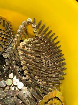 Bucket of New Coils of Roofing Nails
