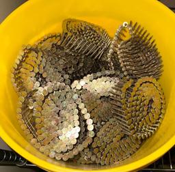 Bucket of New Coils of Roofing Nails
