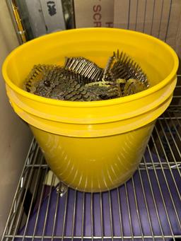 Bucket of New Coils of Roofing Nails