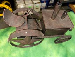 Pair of Over size Cast Iron Cast Spurs and Fabricated Tin Tractor