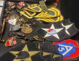 Collection of U.S. Army Patches, Pins, and More