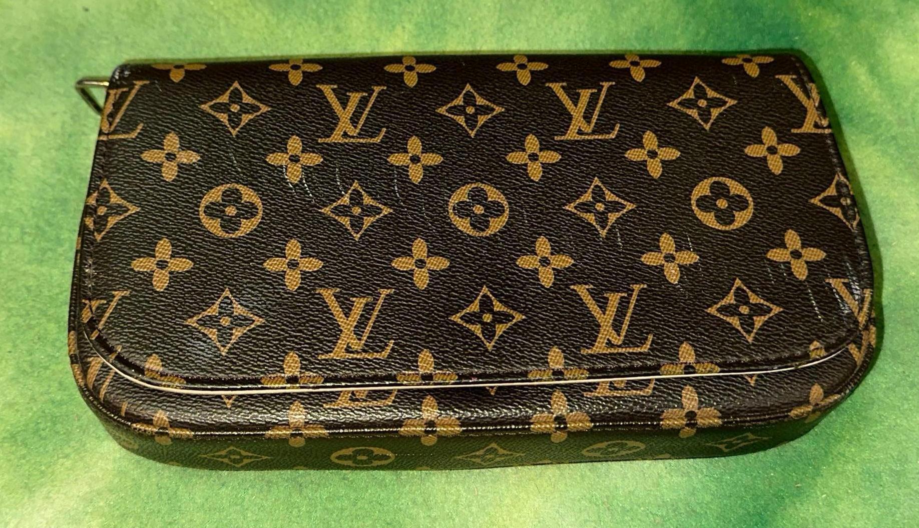 Louis Vuitton Purse (Looks to be Authentic but were not experts)