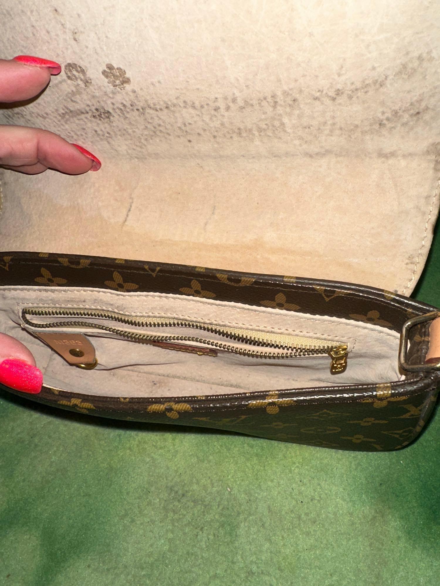 Louis Vuitton Purse (Looks to be Authentic but were not experts)