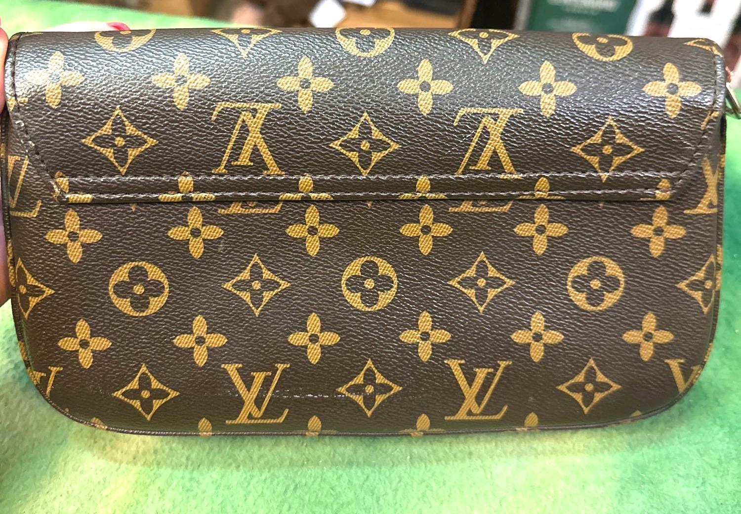 Louis Vuitton Purse (Looks to be Authentic but were not experts)