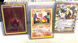 Pokemon cards- Box, Book and 3 Top loaders