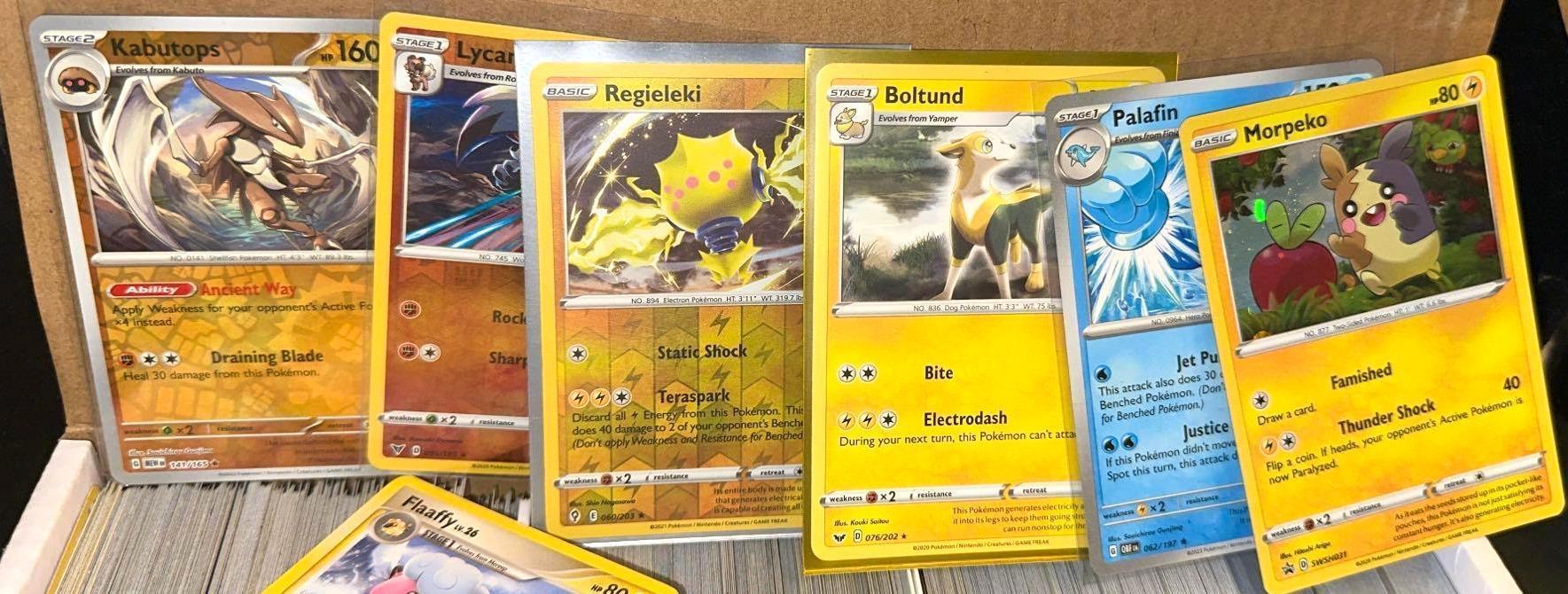 Pokemon cards- Box, Book and 3 Top loaders