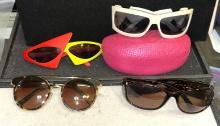 4 Distinctive Pairs of sunglasses and 1 case