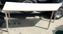 Table with a Little Angle 72"L x 18"W x 31"H