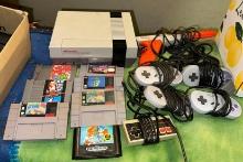 1985 Nintendo Console, 5 Controllers, Zapper and 8 Video Games