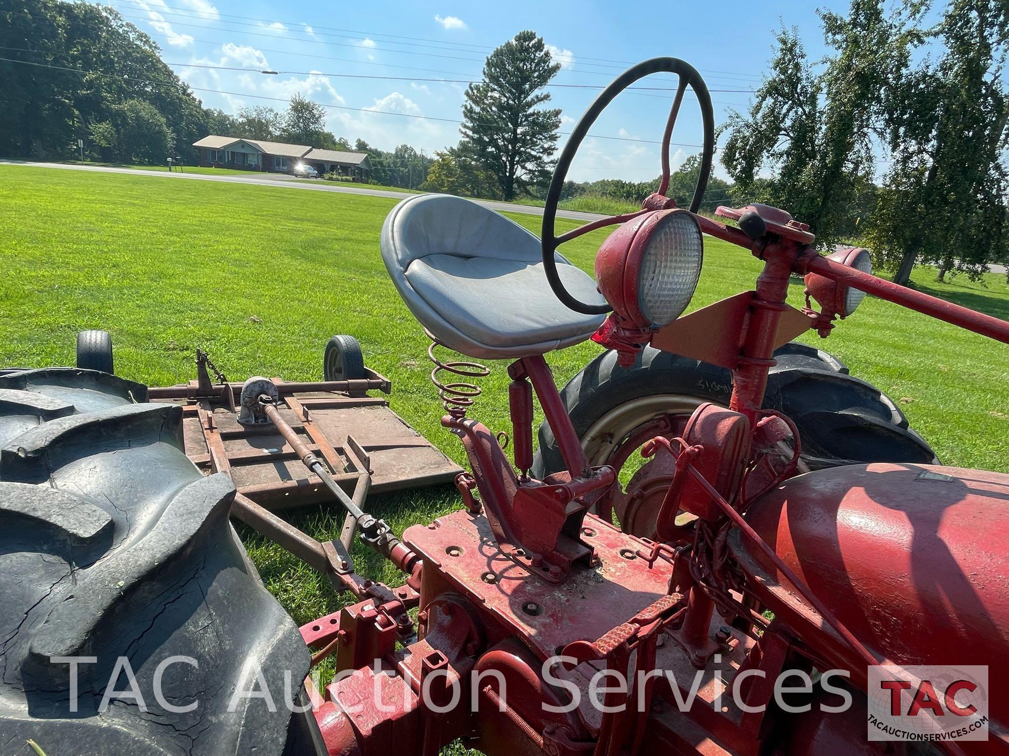 1949 Farmall H Row Crop Tractor with Rotary Cutter Attachment