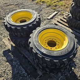 (4) forerunner 10-16.5 skidsteer tires with rims