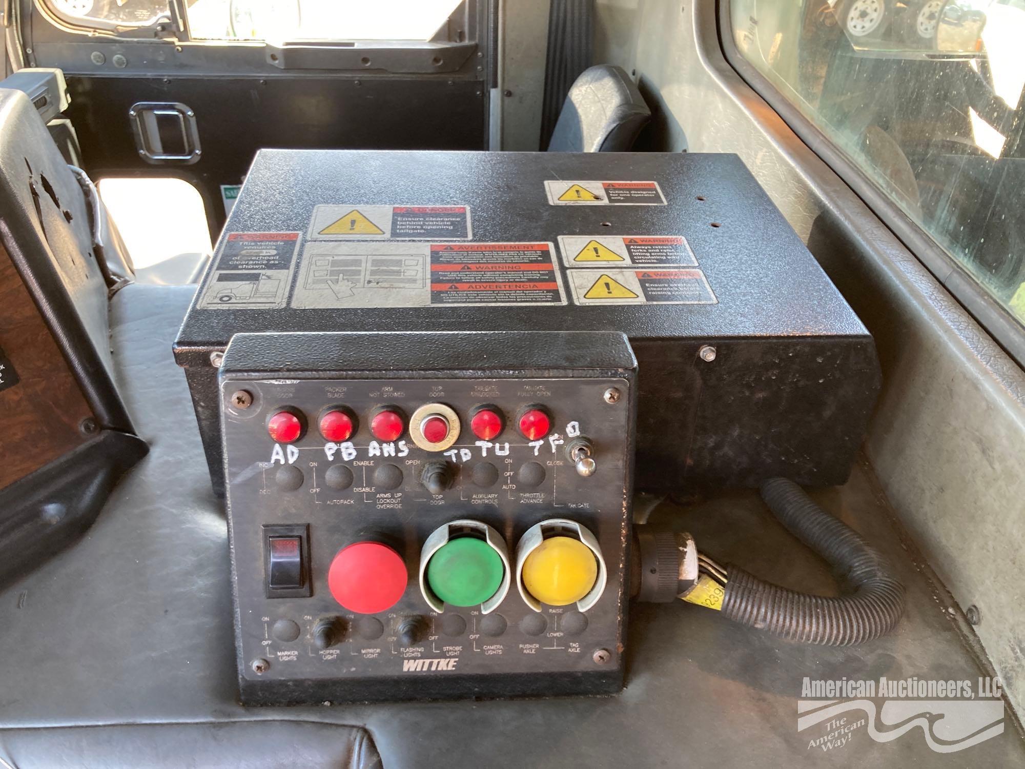 2010 Peterbilt 320 Front Load Trash Truck 38 Cu Yard Packer, VIN # 3BPZL20X1AF107617