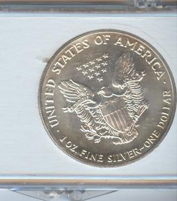 1990 AMERICAN SILVER EAGLE IN CUSTOM HOLDER