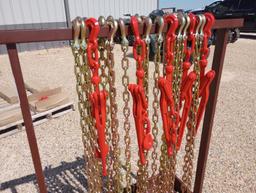 Unused Chain Rack w/(5) Binders & (5) 5/16" 20Ft Chains (5) 3/8" 20Ft Chains