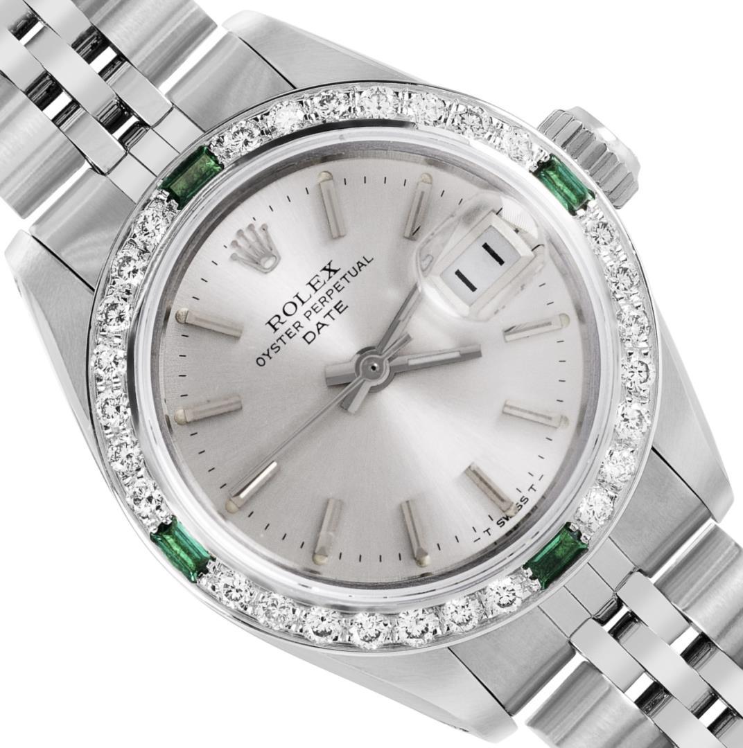 Rolex Ladies Stainless Steel Emerald and Diamond Date Wristwatch With Rolex Box