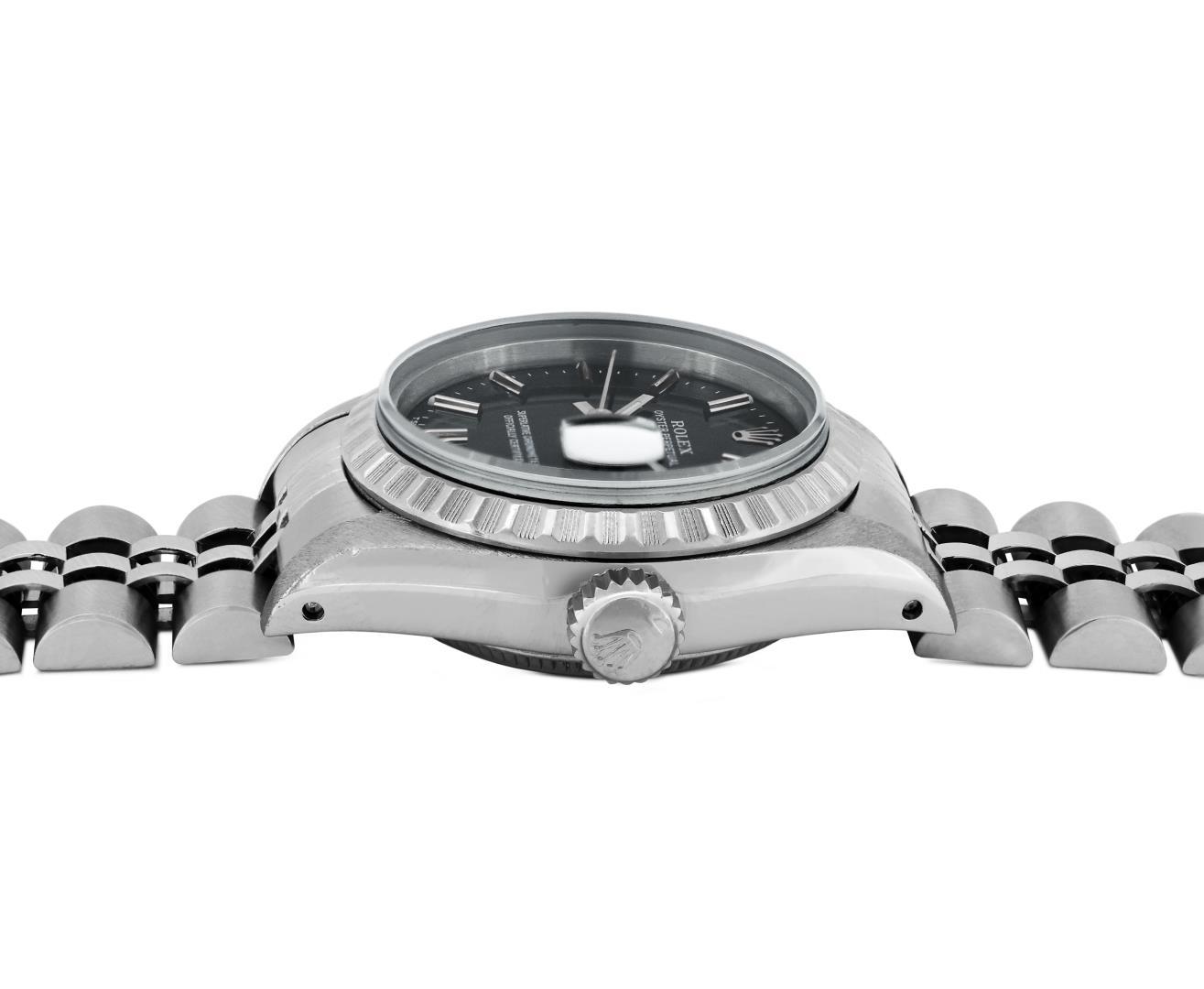 Rolex Ladies Stainless Steel Black Index Date Wristwatch With Rolex Box