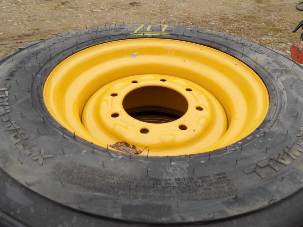 (4) New 12-16.5 Tires on Cat Rims (4x Bid Price)
