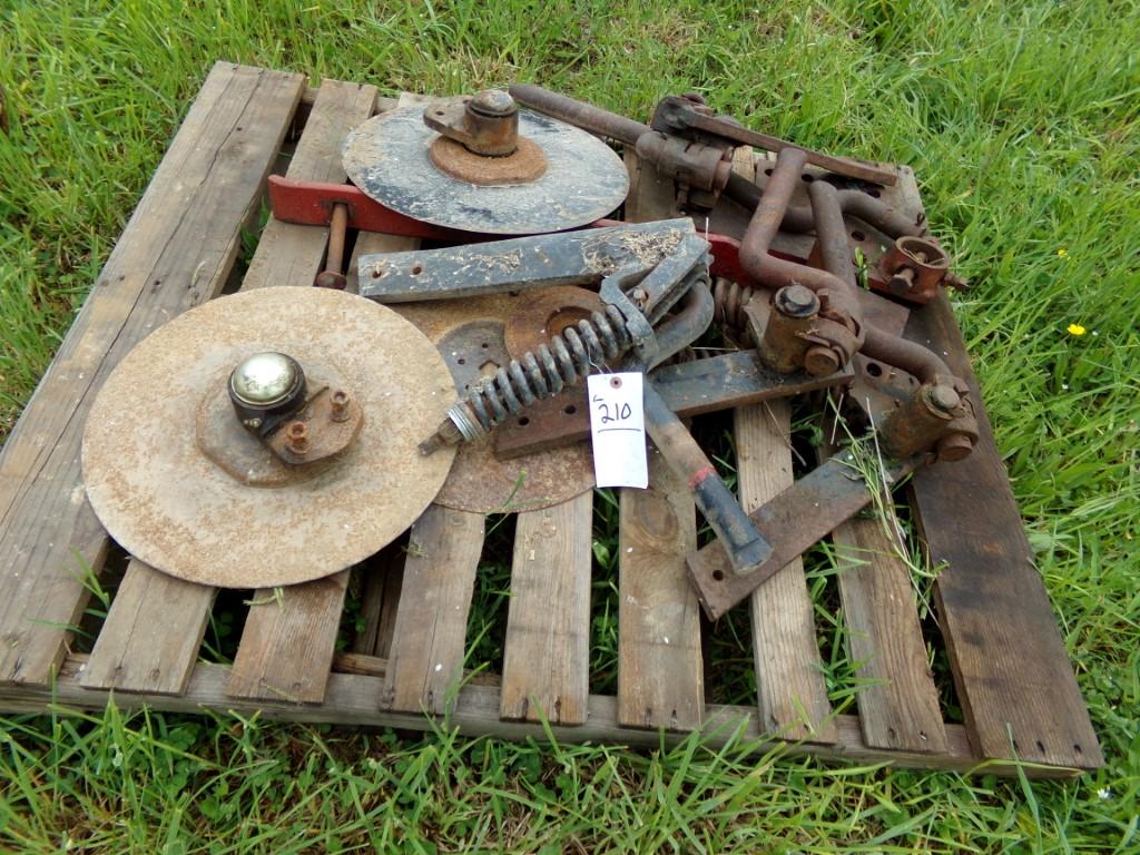 Plow Parts On A Pallet, Coulters, Spring Trips, Coulter Mounts, Etc.