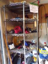 Contents Of Corner Shelf- Wheel Chocks, Hand-Held Vac, Hose Clamps, Bow Saw