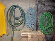 (2) Garden Hoses, An Electrict Cord w/No Ends (Front Garage Upstairs)