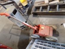 Orange 4-Wheeled Line Sprayer