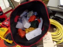 Black and Red Bag with Assorted Multiple Outlet Plugs
