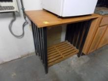 36'' x 23 1/2'' Oak Color and Black Table with Shelf Underneath (Back Room)