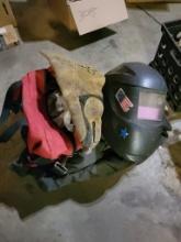 Box With Welding Gloves, Helmet, Clamps, And Other Related Items