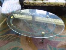 Oval Shaped Glass Top Coffee Table, 50'' x 28'', Gray Steel Frame Underneat