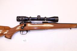 Weatherby Mark V cal. 7mm W.M. #H155334 w/ Weatherby 3x9x40 Scipe