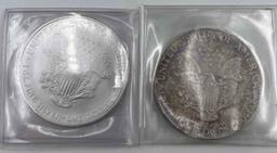 1986 & 2006 Uncirculated US Silver Eagle. 1986 is in original box.
