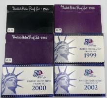 1975, 1986, 1987,1999,2000,& 2002 US Mint Proof Sets (6 sets total).