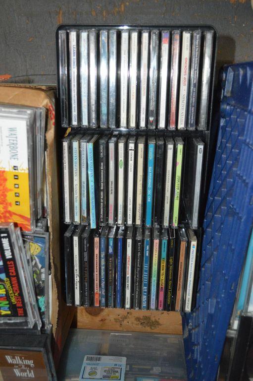 SMALL BIN WITH APPROX. (40) CD'S AND (4) BOXED SETS