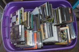 100'S OF MIXED MUSIC CD'S IN PURPLE BIN