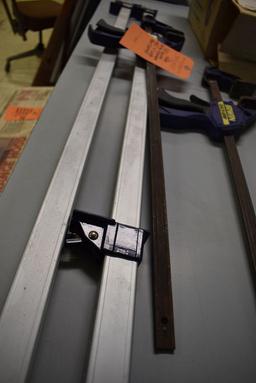 (2) QUICK GRIP CLAMPS AND (2) 4' LONG BAR CLAMPS