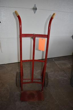 RED TWO HANDLED HAND TRUCK, 45"H, 10" SOLID WHEELS
