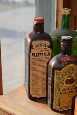 VINTAGE GLASS BOTTLES, TINS AND FLASK