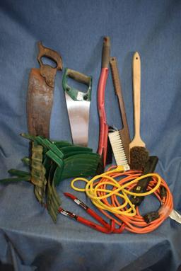 BOX WITH HOSE HOLDERS, SAWS, PRYBARS AND EXTENSION CORDS,