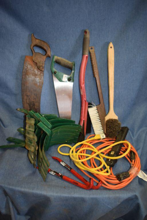 BOX WITH HOSE HOLDERS, SAWS, PRYBARS AND EXTENSION CORDS,