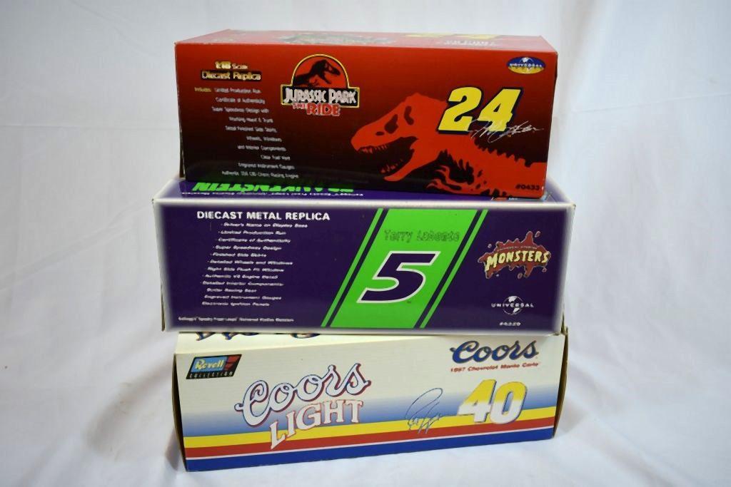 (3) 1/18" SCALE DIE CAST COLLECTORS CARS IN BOXES;