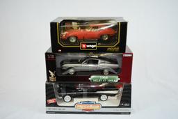 (3) 1/18" SCALE DIE CAST COLLECTORS CARS IN BOXES;