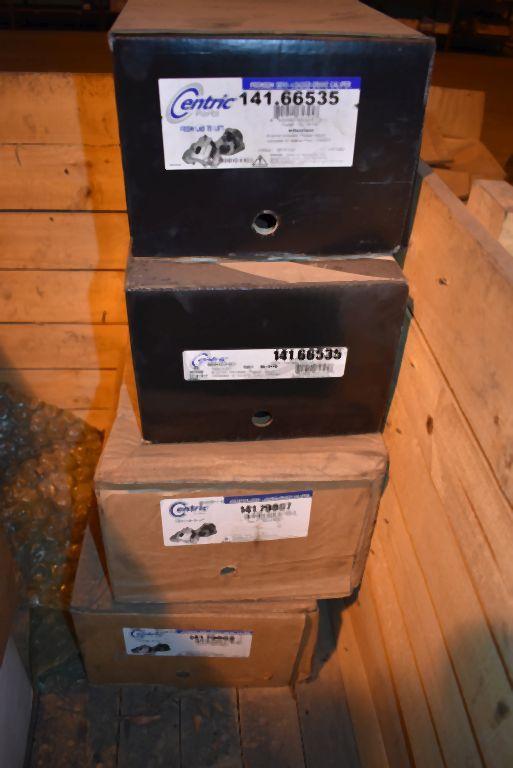 CRATE WITH MISC. TRUCK BRAKE CALIPERS AND SOME CORES