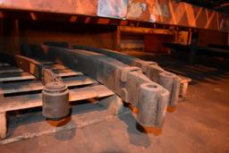 LARGE ASSORTMENT OF HELPER SPRINGS ON LOWER SHELF