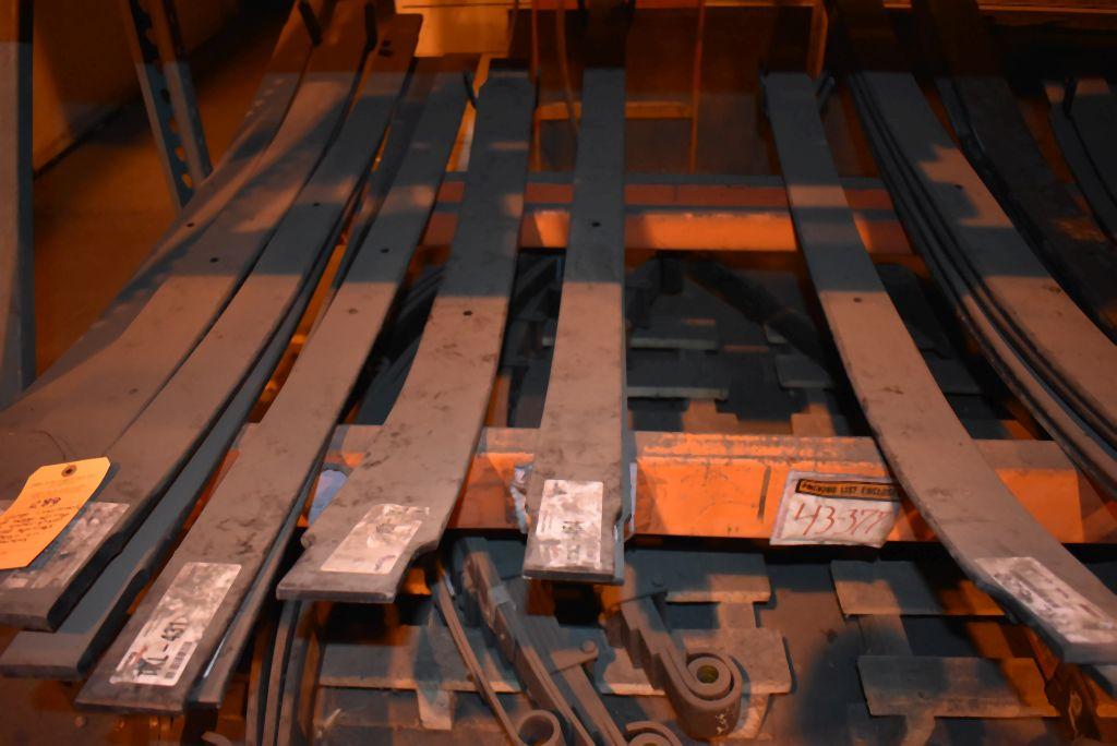 LARGE ASSORTMENT OF HELPER SPRINGS ON LOWER SHELF