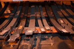 LARGE ASSORTMENT OF HELPER SPRINGS ON LOWER SHELF