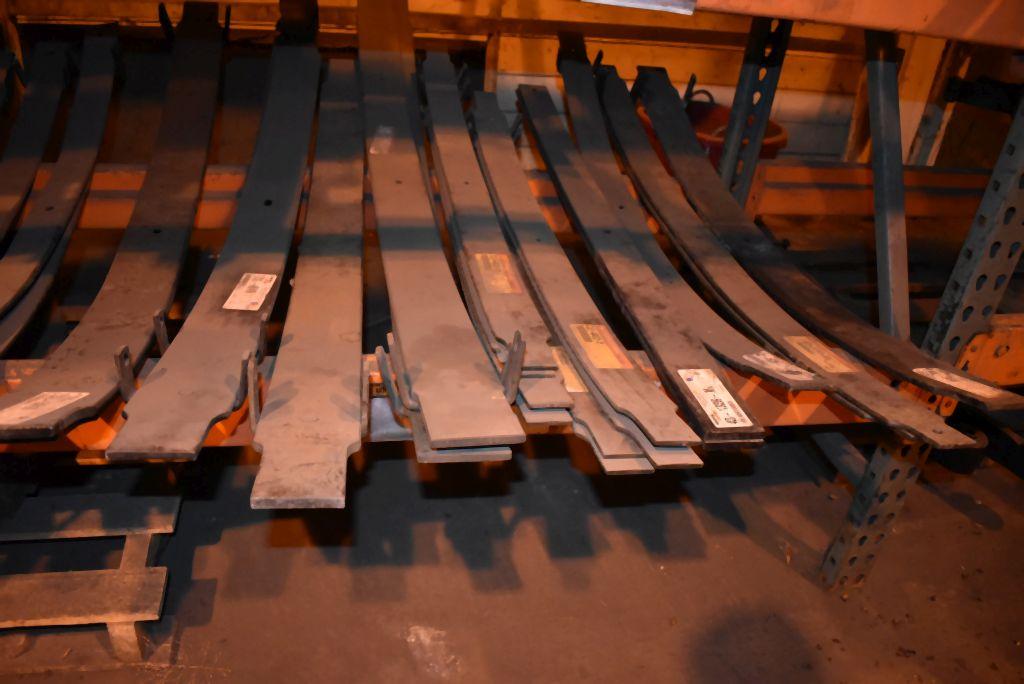 LARGE ASSORTMENT OF HELPER SPRINGS ON LOWER SHELF