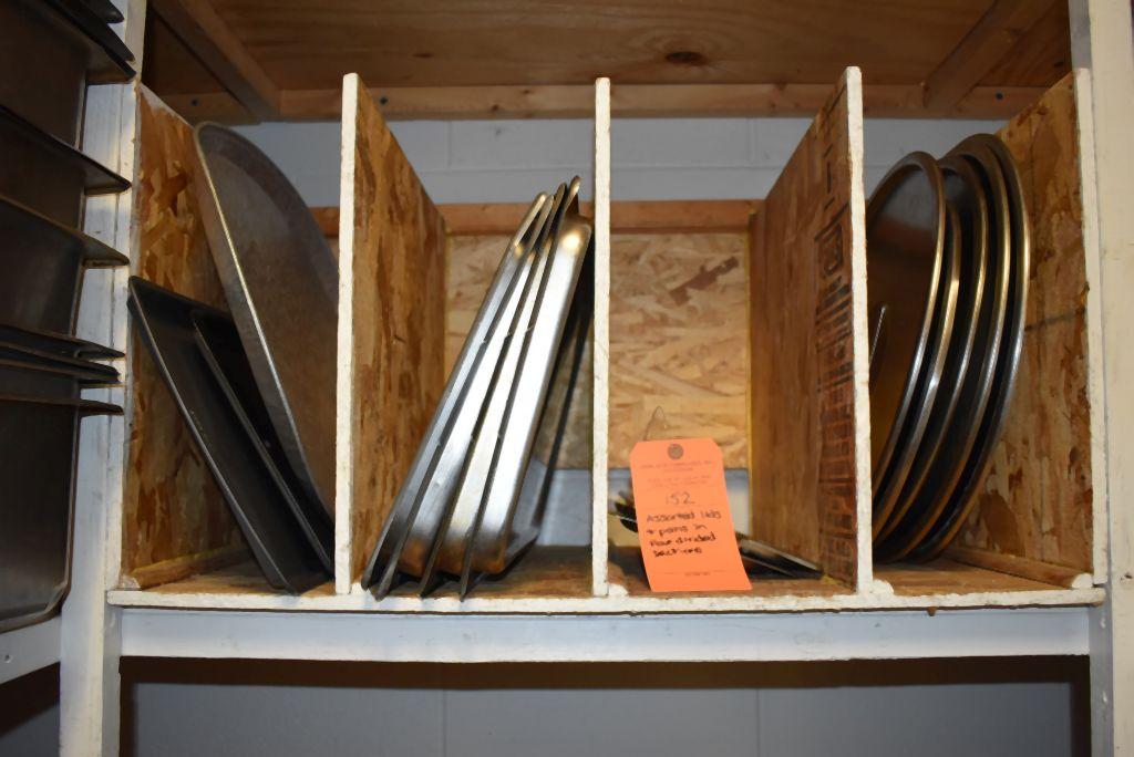 ASSORTED LIDS AND PANS IN FOUR DIVIDED SECTIONS