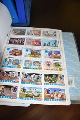 THOUSANDS OF FOREIGN STAMPS - (9) BINDERS; LAOS